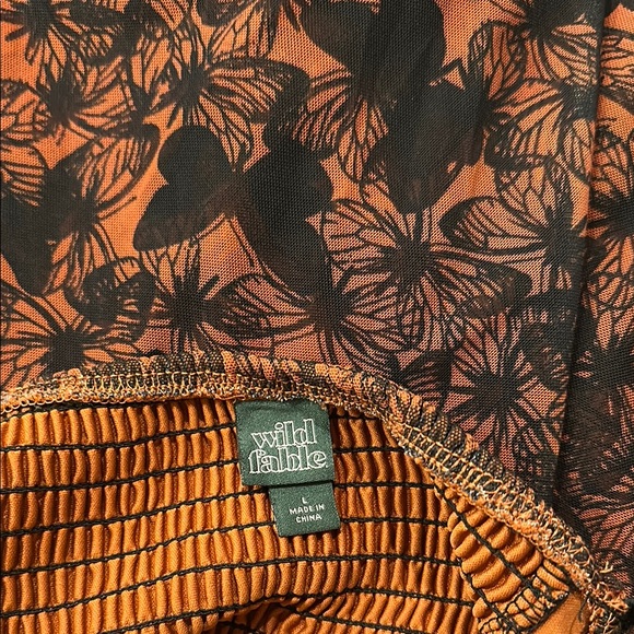 Black and burnt orange butterfly pattern babydoll dress - Picture 3 of 3